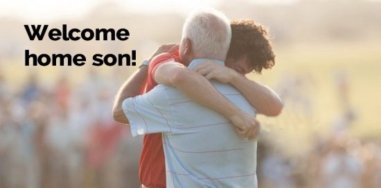 Father hugs son
